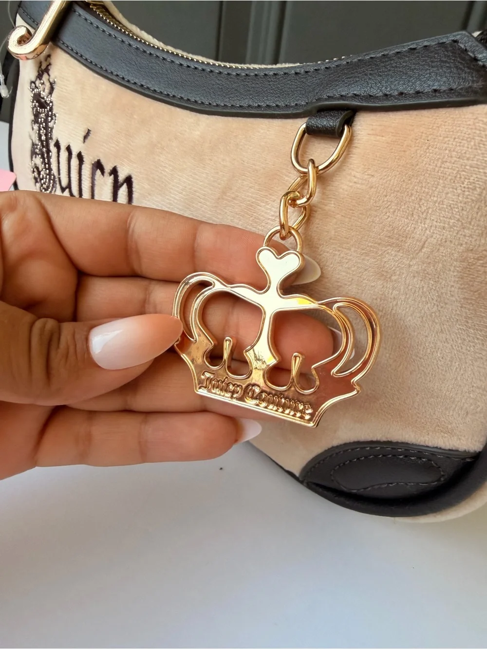 Juicy Couture Beige Suede Shoulder Bag with Black Trim and Gold Charm
